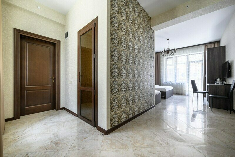 Трехместный номер с балконом