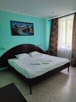 Четырехместный стандарт с 2-мя большими кроватями улучшенный, Загородный клуб Берлога, Тула