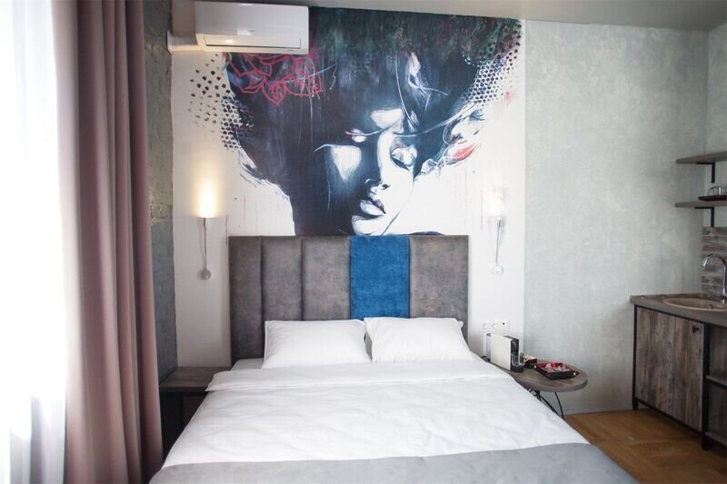 Семейный 4-местный (Полулюкс с видом на сад)