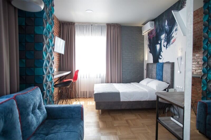 Семейный 4-местный (Полулюкс с видом на сад)