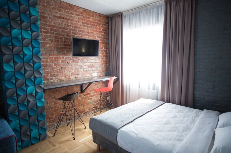 Семейный 4-местный (Полулюкс с видом на сад)