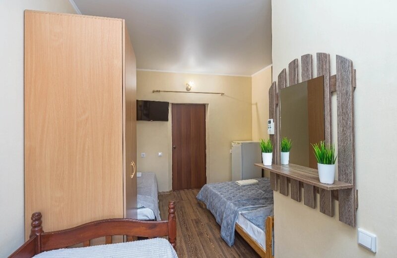 Семейный 4-местный (с 2 односпальными кроватями)