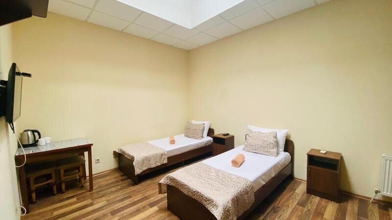 Бюджетный 2-местный (мансардный, с 2 кроватями)