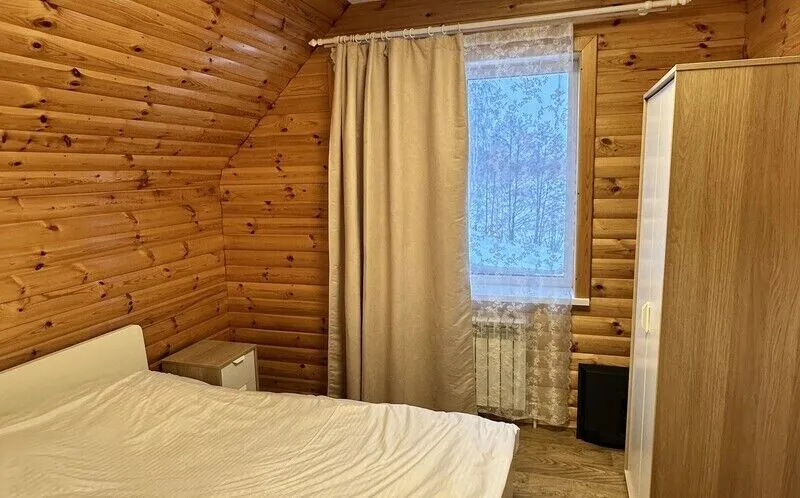 Дом с финской сауной в деревянном стиле