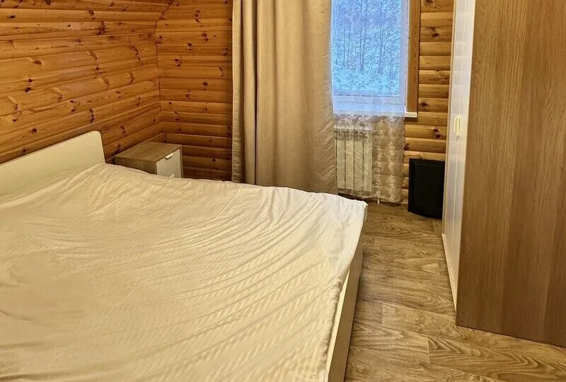 Дом с финской сауной в деревянном стиле