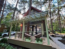 Коттедж с 3 комнатами с красивым видом из окна, База отдыха Шепот Вашаны, Бунырево