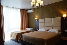 Трёхместный номер Standard с балконом, База отдыха Holiday Park Жоэквара, Гагра