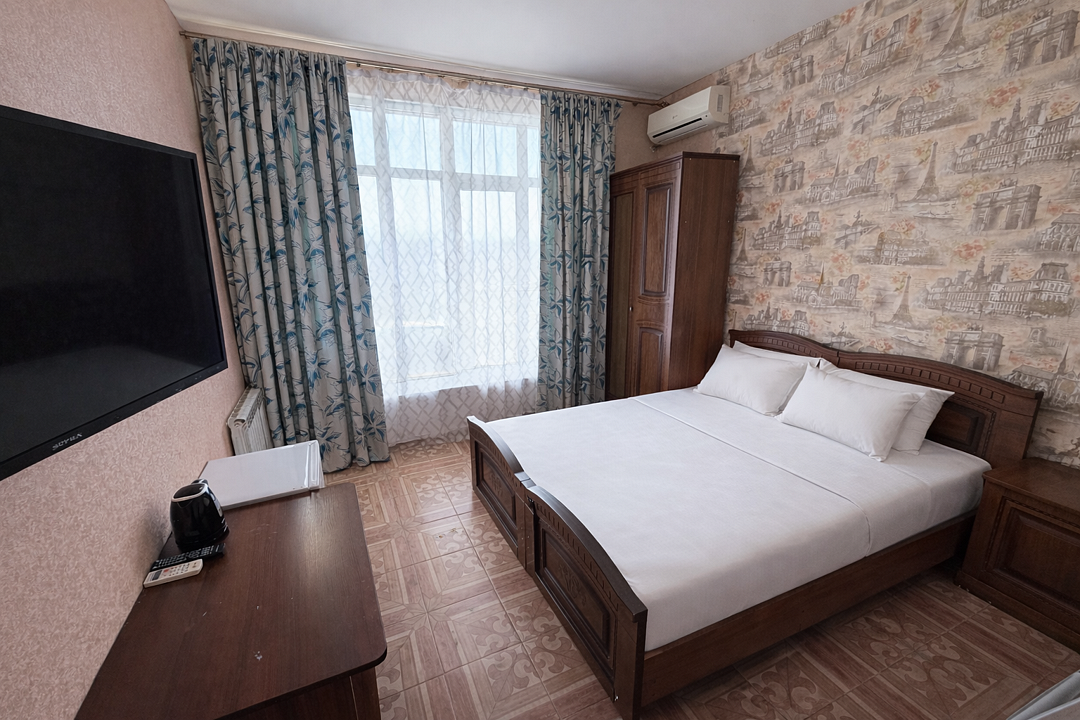 Улучшенный 4-местный 1-комнатный (с балконом, вид на горы)