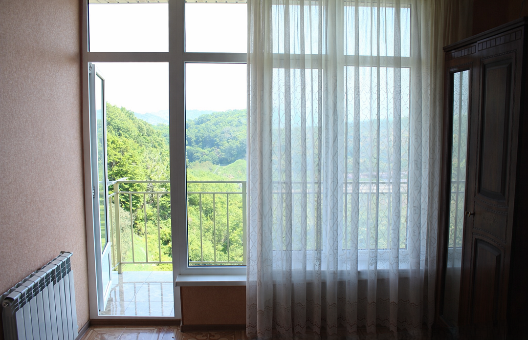 Улучшенный 4-местный 1-комнатный (с балконом, вид на горы)