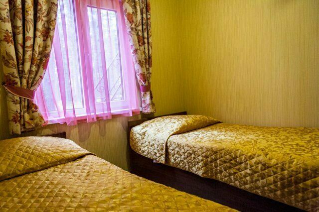 Номер с двумя односпальными кроватями